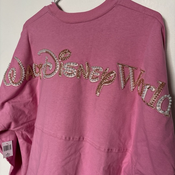 Disney Tops - Disney Parks 2026 Pearl & Bead Pink Spirit Jersey, new with tags